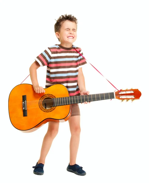 Little boy plays guitar country style — Stok fotoğraf