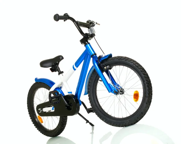 Детский велосипед с отражением — стоковое фото