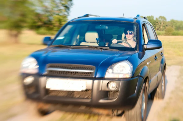 stock image Offroad car drive with woman steering