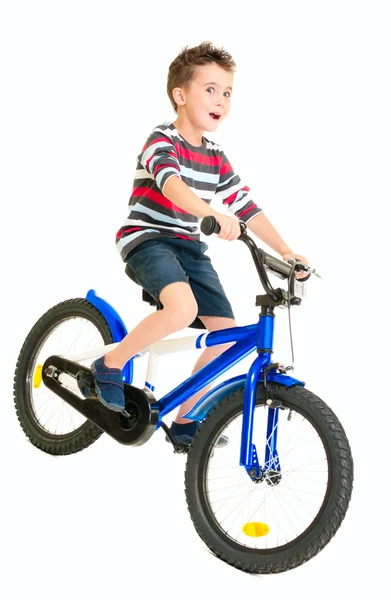 Felice cattivo bambino in sella alla bici — Foto Stock