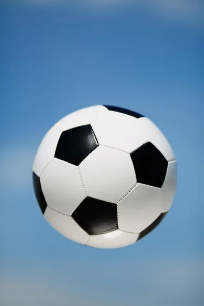 Soccer ball in the air — Stock Photo, Image