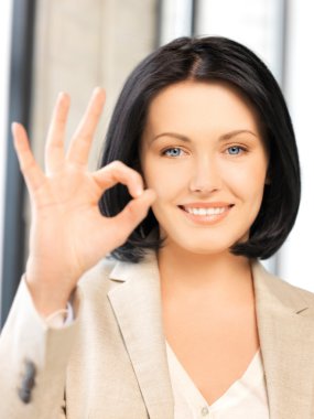 Young woman showing ok sign clipart