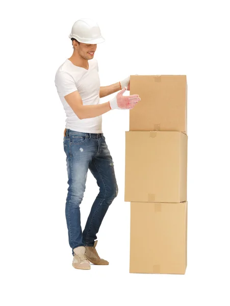 Bonito homem com grandes caixas — Fotografia de Stock