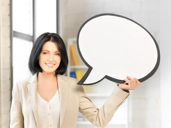 Smiling businesswoman with blank text bubble — Stock Photo, Image