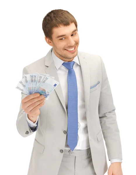 Euro nakit para ile yakışıklı adam — Stok fotoğraf