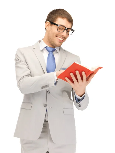 Счастливый человек с книгой — стоковое фото