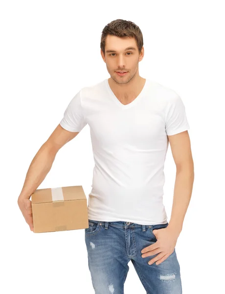 Чоловік у білій сорочці з парселем — стокове фото