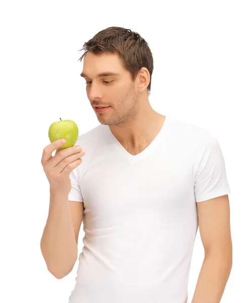 Férfi fehér inget, zöld almával — Stock Fotó
