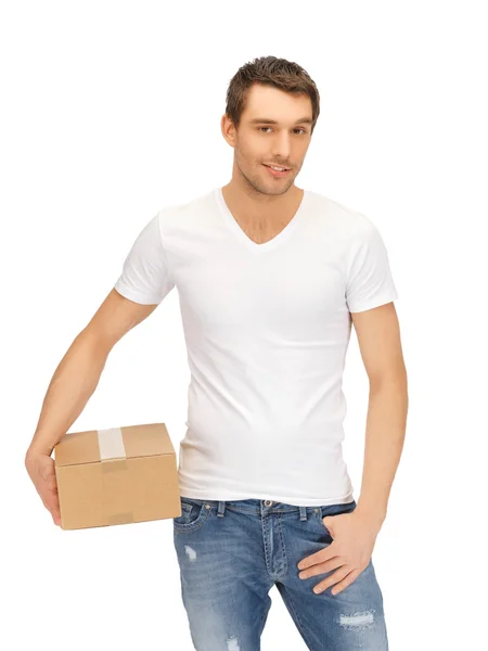 Man in wit overhemd met parsel — Stockfoto