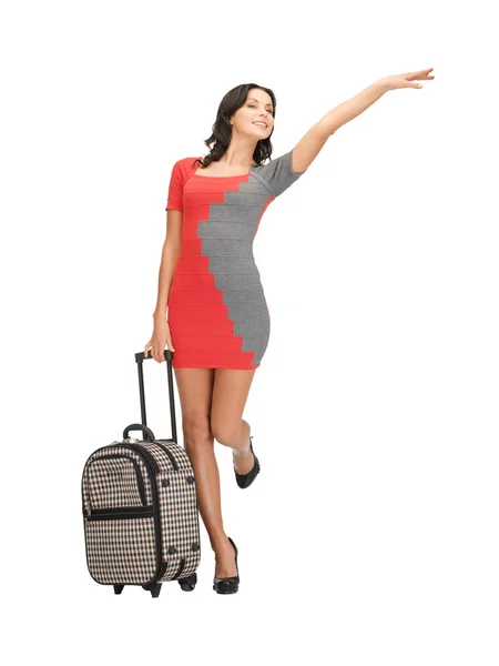Hitch-hiking woman with suitcase — Stock Photo, Image