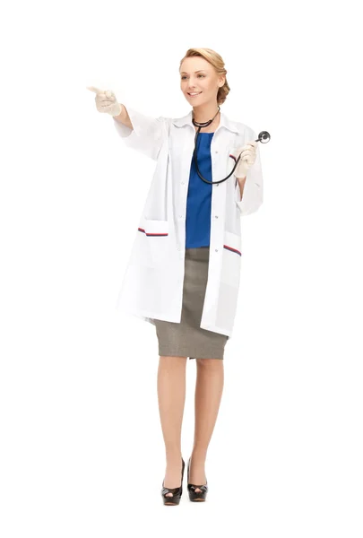 Atractiva doctora señalando su dedo — Foto de Stock