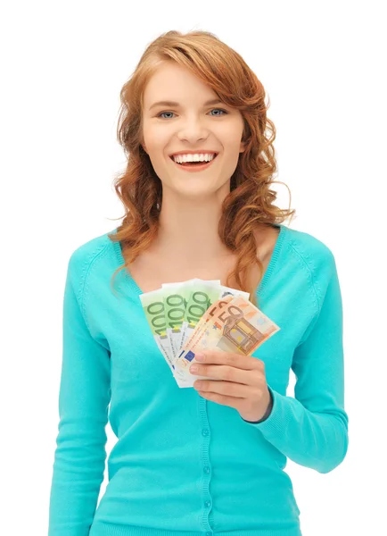 Feliz adolescente con dinero en efectivo en euros —  Fotos de Stock