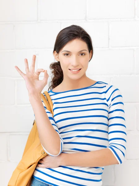 Happy teenage girl showing ok sign — Stock Photo, Image