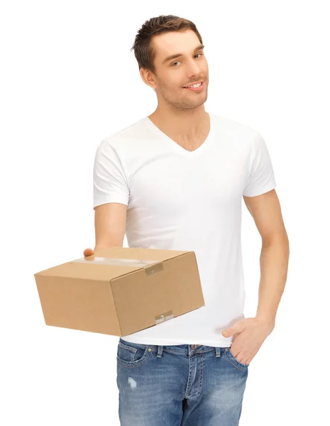 Мужчина в белой рубашке с парселом Стоковая Картинка