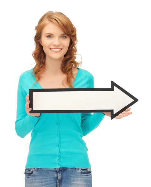 Teenage girl with direction arrow sign — Stock Photo, Image
