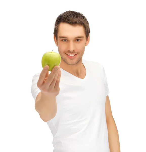 青リンゴと白いシャツの男 — ストック写真