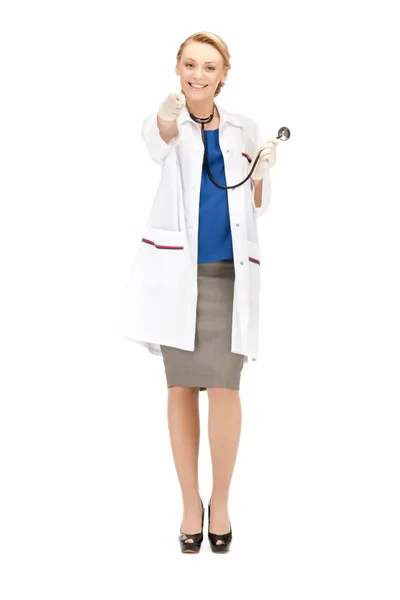 Attrayant médecin féminin pointant son doigt Photo De Stock