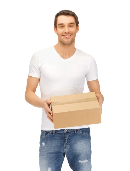 Man in white shirt with parsel — Stock Photo, Image
