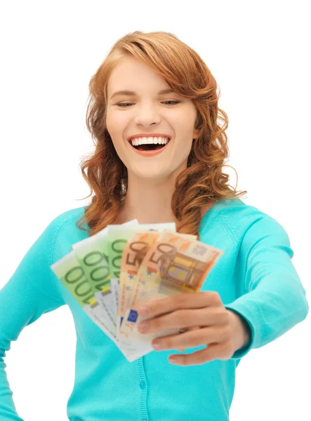 Joyeux adolescent fille avec de l'argent en espèces euro — Photo