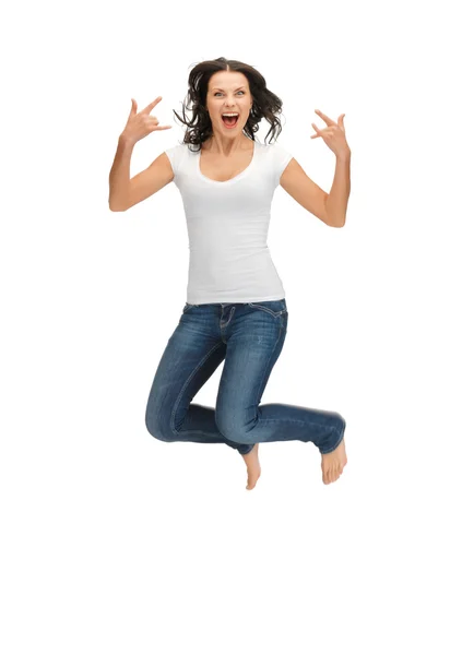 Jumping woman in blank white t-shirt — Stock Photo, Image