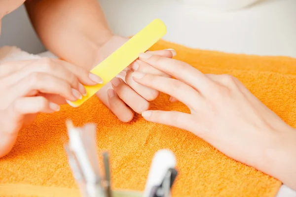 Manicure process on female hands — Stock Photo, Image