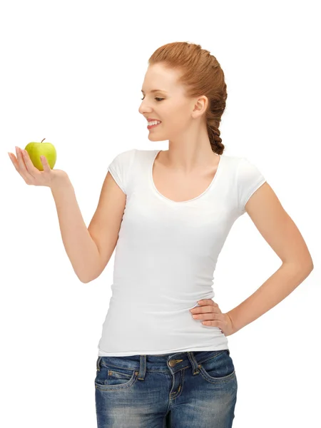Nastolatka z zielonym jabłkiem — Zdjęcie stockowe
