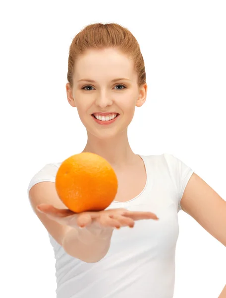 Menina adolescente com laranja Imagem De Stock