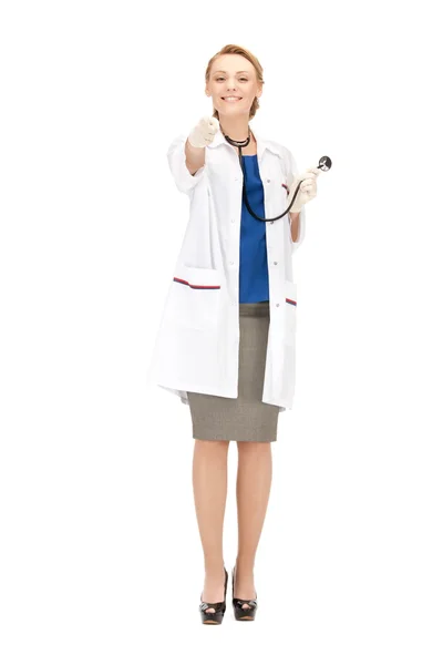 Привлекательная женщина-врач указывает пальцем Лицензионные Стоковые Фото