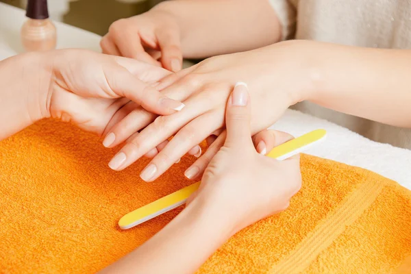 Manicure process on female hands — Stock Photo, Image