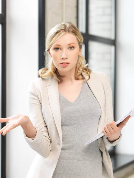 Worried woman with documents — Stock Photo, Image