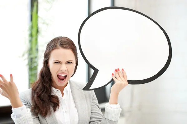 Mulher de negócios gritando com bolha de texto em branco — Fotografia de Stock
