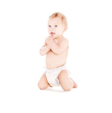 Sitting baby boy in diaper clipart