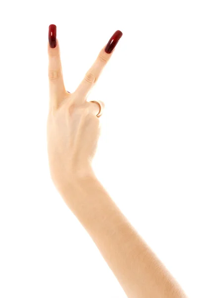 Ręka z długo akrylowe paznokcie Wyświetlono znak zwycięstwo — Zdjęcie stockowe