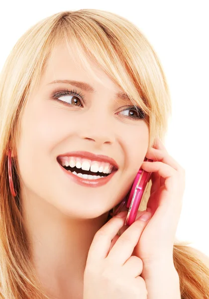 Glückliches Mädchen mit rosa Telefon — Stockfoto