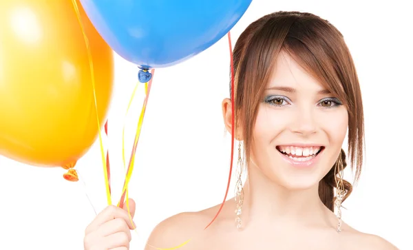 Glad tonårsflicka med ballonger — Stockfoto