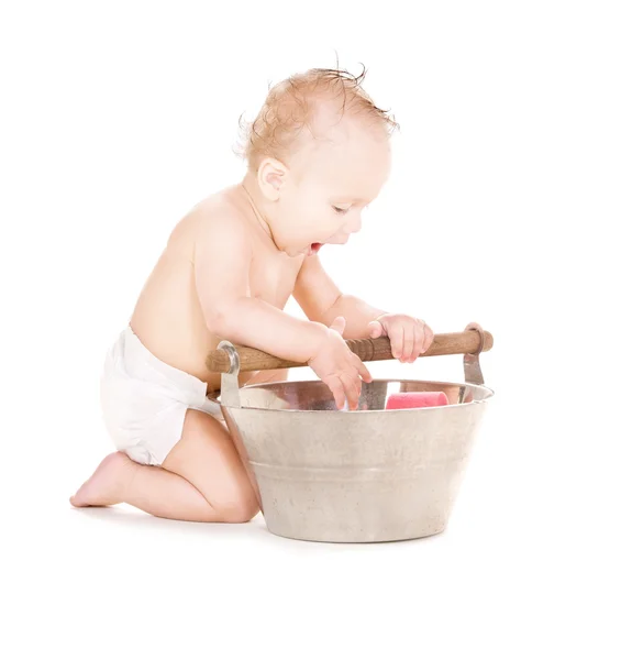 Baby boy with wash-tub — Stock Photo, Image