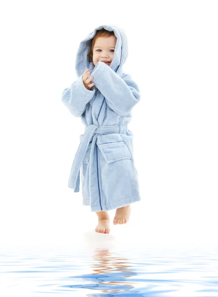 Мальчик в синем халате — стоковое фото