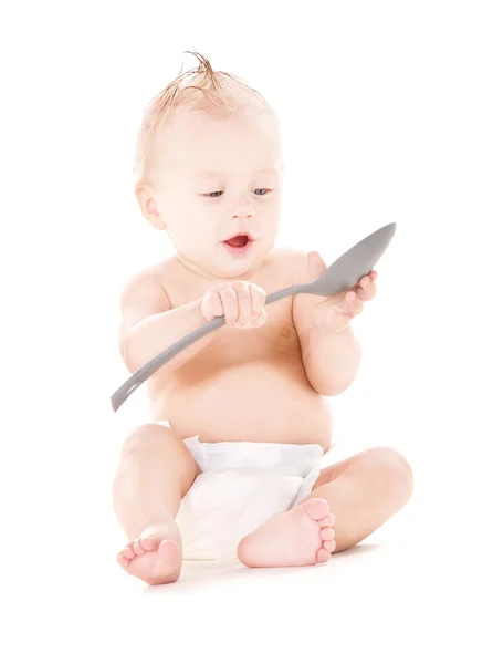 Niño con cuchara grande — Foto de Stock