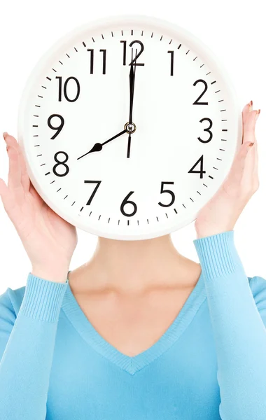 Woman with big clock covering face — Stock Photo, Image