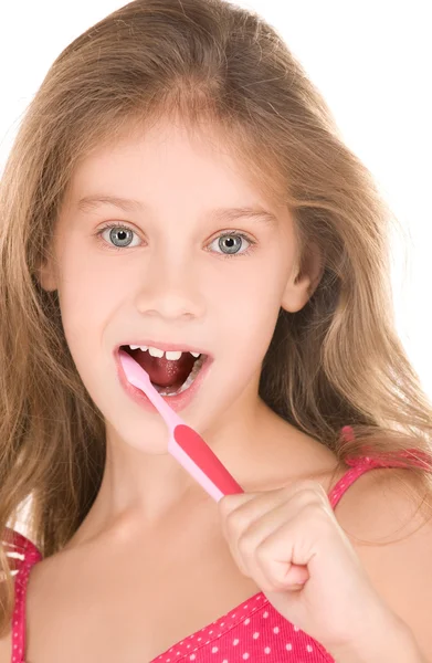 Fille heureuse avec brosse à dents — Photo