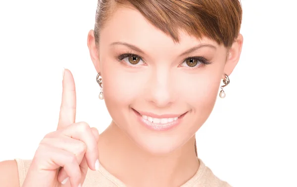 Woman with her finger up — Stock Photo, Image