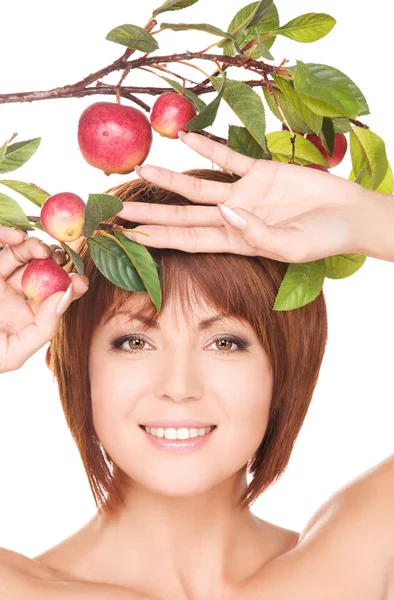 Mulher feliz com galho de maçã — Fotografia de Stock