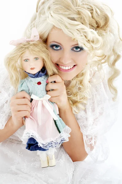Happy bride with doll — Stock Photo, Image