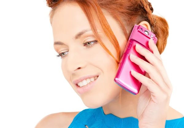 Happy woman with pink phone — Stock Photo, Image