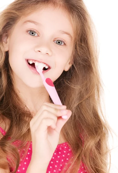 Fille heureuse avec brosse à dents — Photo