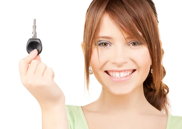 Happy teenage girl with car key — Stock Photo, Image