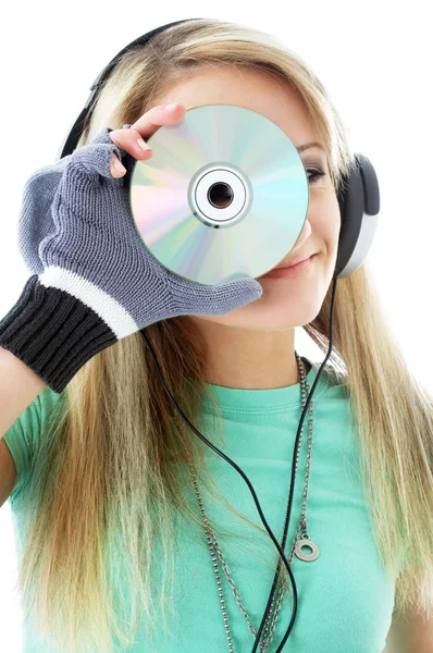 Stedelijke tienermeisje hoofdtelefoon waarin cd-rom — Stockfoto