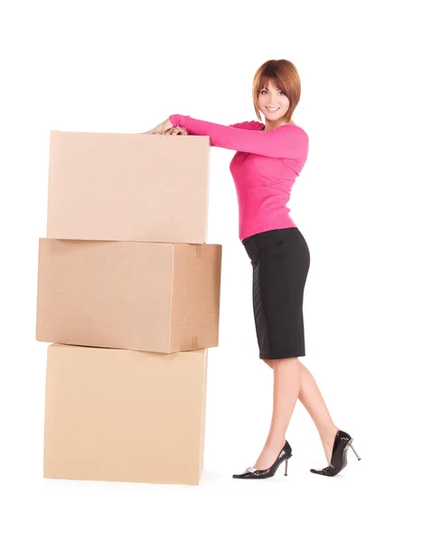 Businesswoman with boxes — Stock Photo, Image