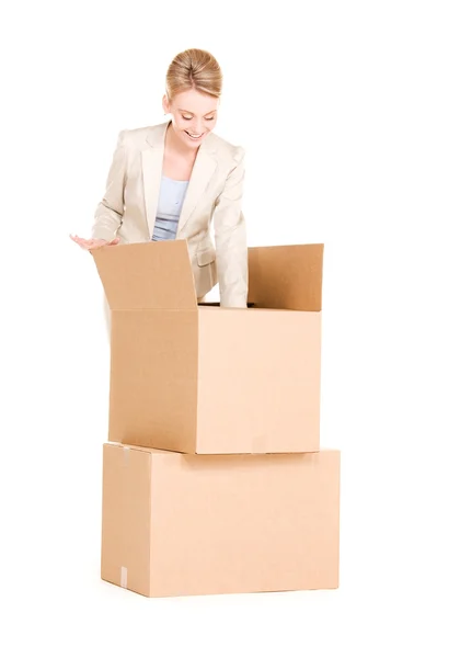 Businesswoman with boxes — Stock Photo, Image