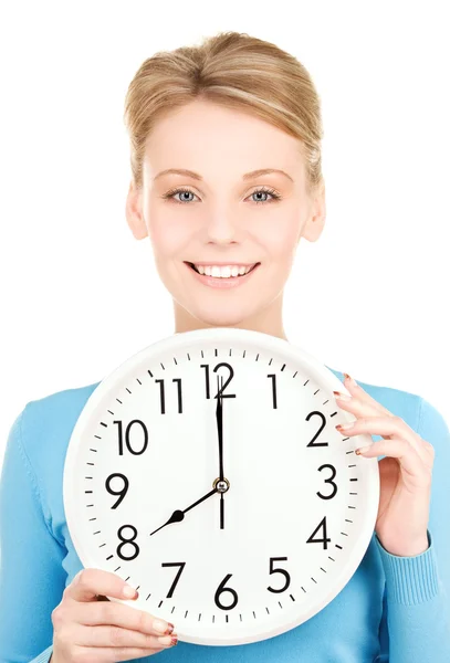 Woman holding big clock Stock Image